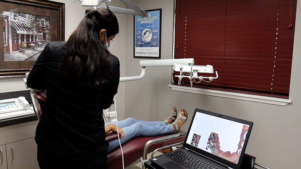 Female patient with technician getting 3D scan